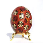 Spiraling Kokopelli on Copper Egg